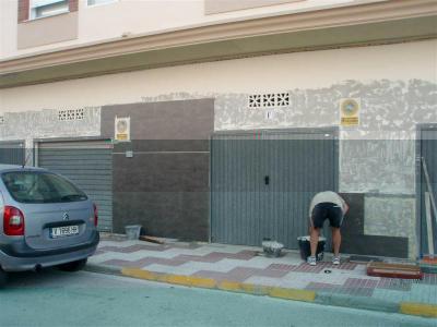 Fachada: Chapado planta baja